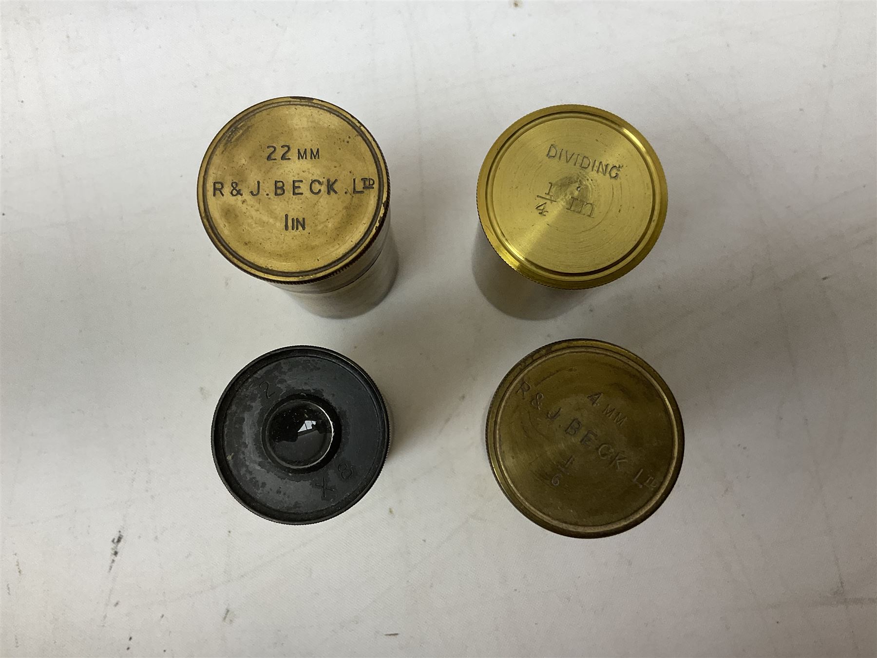  Brass field microscope, together with a cased microscope and twenty five microscope slides