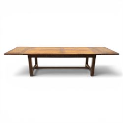 Country pine draw leaf table, bench seat and six chapel chairs, the top of plank construction, with two frieze drawers, additional leaves extending to 320cm, with bench seat and six elm chapel seats