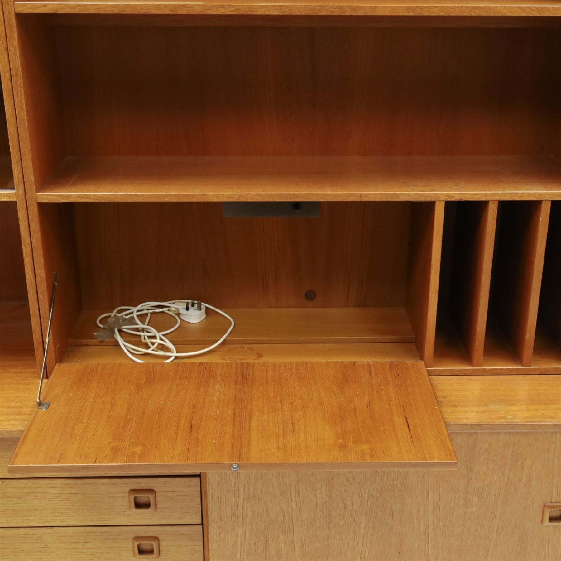 Clausen & Son Silkeborg - Danish 1960s teak highboard wall unit, the upper modular section with open shelves, smoked glass sliding doors and 12