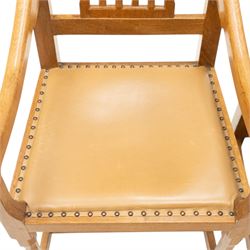 Rabbitman - pair of Yorkshire oak carver open armchairs, pierced and carved lattice back over tan leather seat with studwork, raised on octagonal supports united by H stretchers, carved with rabbit signature, by Peter Heap of Wetwang