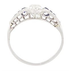 Platinum diamond and sapphire ring, the principal old cushion cut diamond of approx 1.50 carat, each side set with three graduating calibre cut sapphires and old cut diamond surround