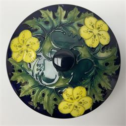 Moorcroft dish and cover, of circular form, decorated in Buttercup pattern, together with a Moorcroft vase, of baluster form, decorated in Magnolia pattern, both with printed marks beneath, tallest H9.5cm
