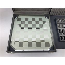 Swarovski silver crystal cut glass chess set, with clear and black pieces on mirrored board, in original presentation box 