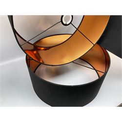 Three 'Oro' pendant drum lamp shades in black and copper, D45cm