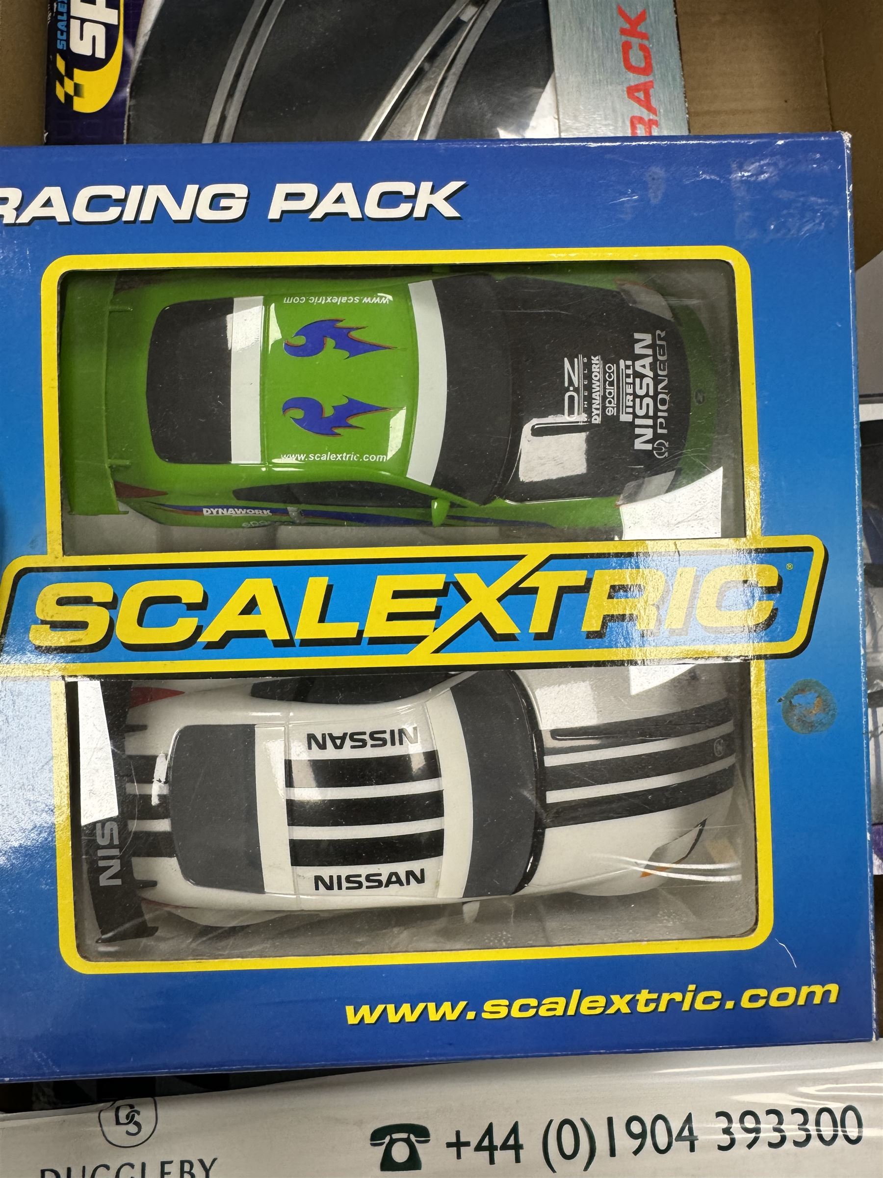 Quantity of Scalextric, including various sets; Digital Driver, Nissan Championship, Moto GP1, App Race control set and a collection of track and other accessories as per list