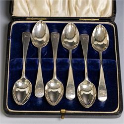 Set of six 1920s silver teaspoons with engraved initials, together with two sets of silver handled tea and fruit knives, all hallmarked and all within fitted cases