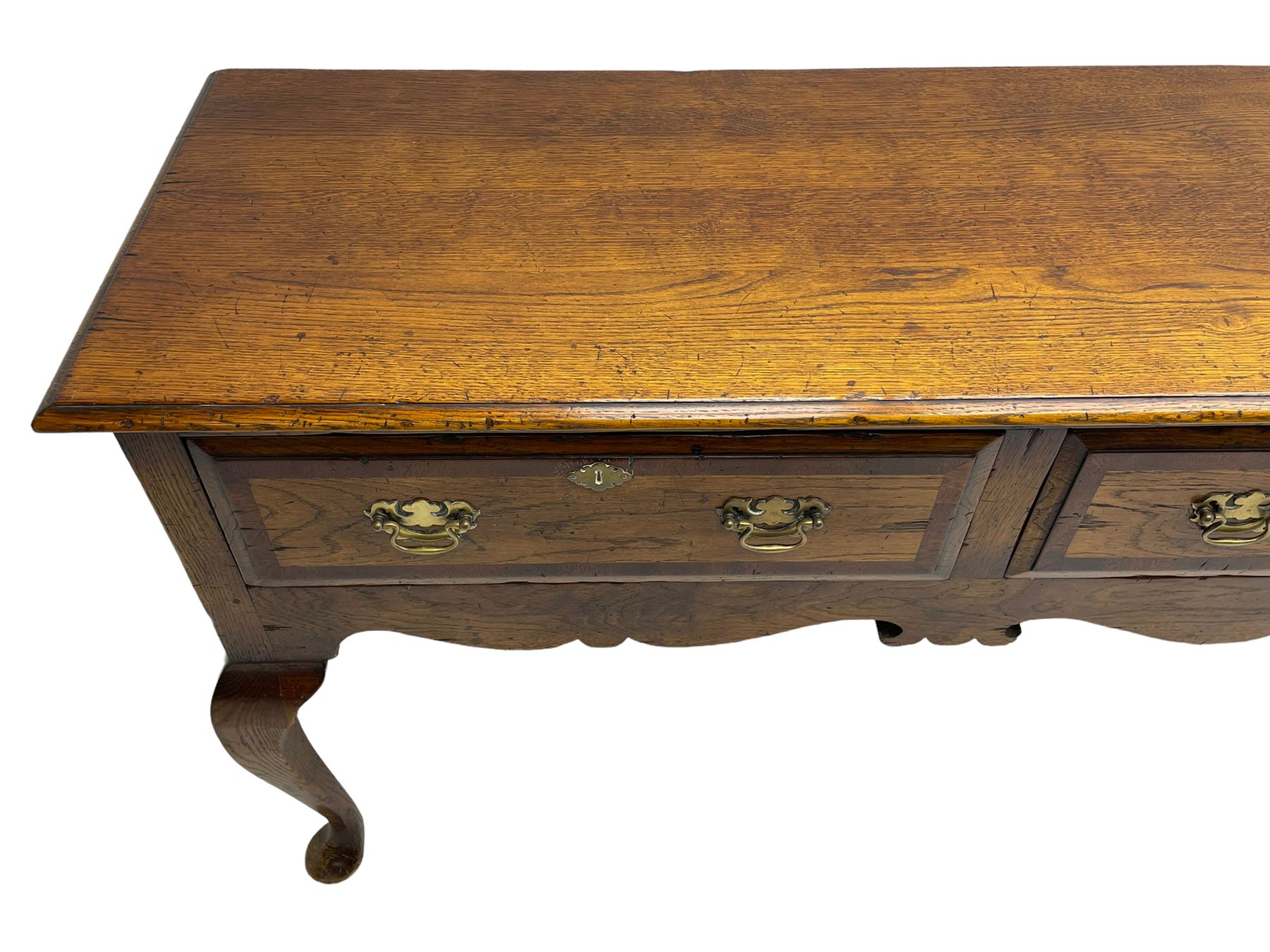 Georgian design oak dresser base, moulded rectangular top over three drawers with moulded fronts and mahogany bandings, shaped apron on cabriole front supports