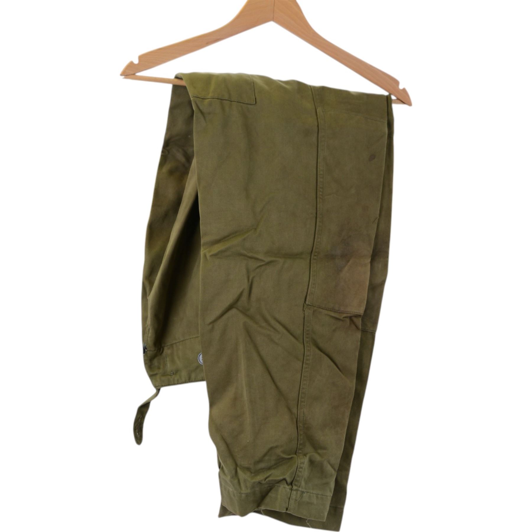 Two British Berets, fine green wool cloth with leather trim, cloth lining having makers details of “BRITISH BERET BASQUE LTD”, one with The Green Howards cap badge, together with other Green Howards buttons and badges, webbing bags and other military items
