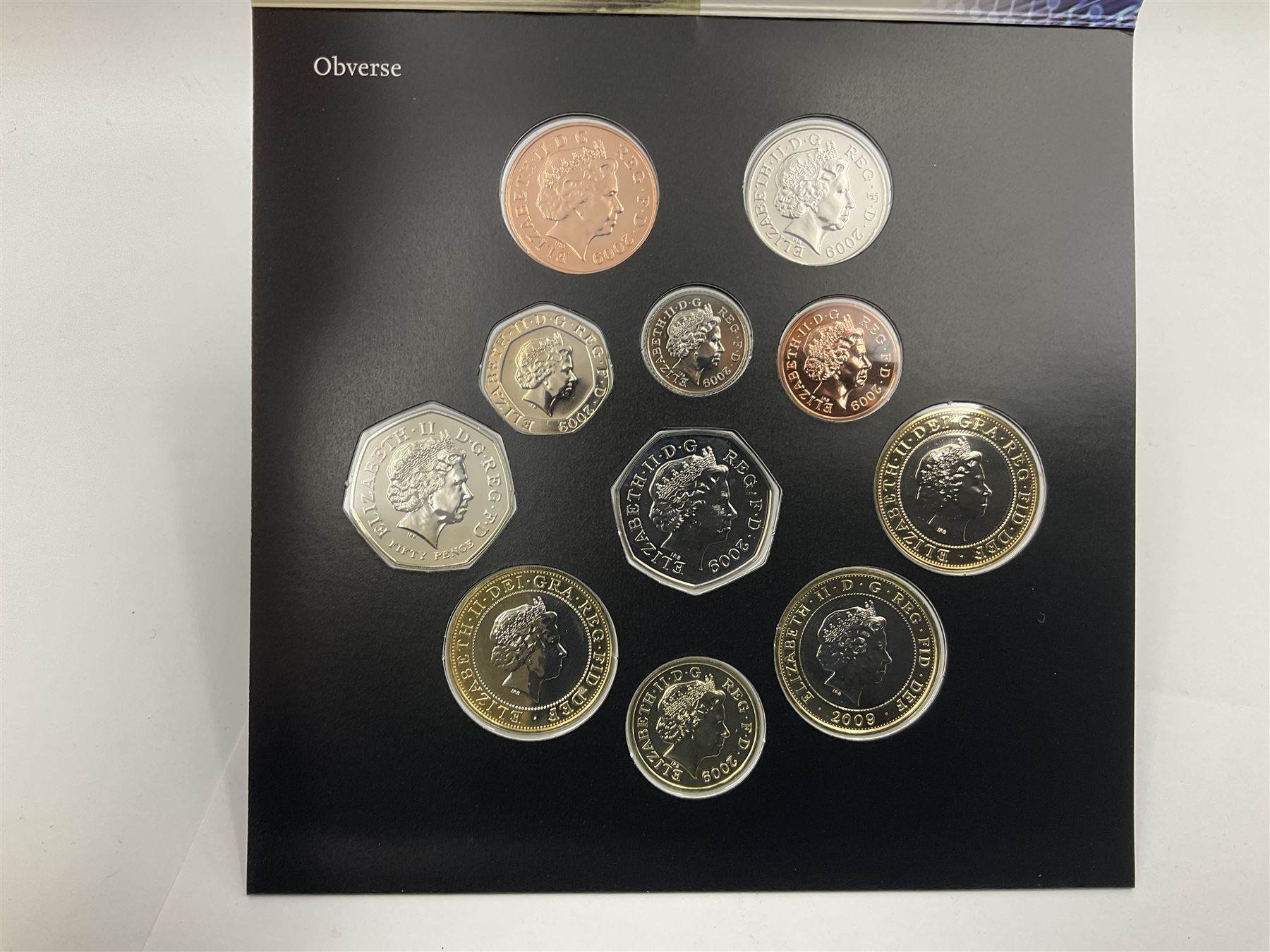 The Royal Mint United Kingdom 2009 brilliant uncirculated coin collection, including Kew Gardens fifty pence, in card folder