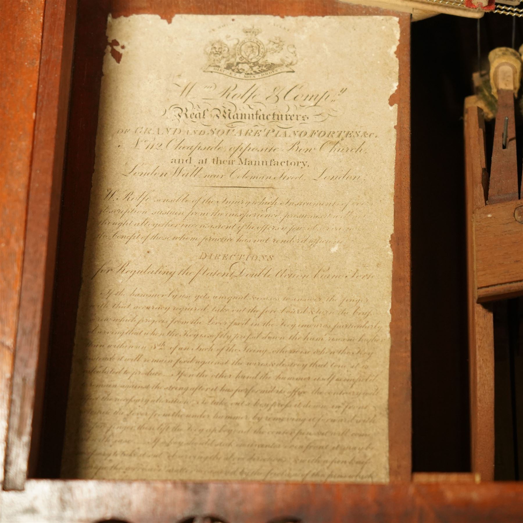 Early 19th century George IV Square Piano by William Rolfe & Co, 112 Cheapside, London, c1821. Mahogany veneered case with rosewood crossbanding and brass stringing, with sustain pedal and reeded legs on a tapered spiral with brass capitals, with three music draws beneath and a folding duet music stand, nameboard with makers name on a round gilt medallion and open silk backed fretwork to the ends, serial No 6699, double strung, English double action with 68 ivory and ebony keys, F1-C7. original strings, hammers and dampers, soundboard and bridge in good condition, with original makers written instructions on regulating the action and tuning the piano attached to the inside of the instrument. In good condition, however the action is in need of regulation and tuning.
William Rolfe is thought to have been in business between 1785 and 1828. 
Given the intricate nature of these historic instruments, specialist support will be available if required, to assist successful buyers with safe removal and onward handling. Price upon application.


This item has been registered for sale under section 10 of the APHA Ivory Act Reference PB6GL6SZ