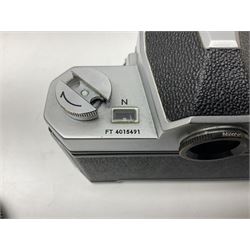 Nikkormat FT2 camera body, serial no. 5066813, in original packaging, together with Nikkormat EL camera body, serial no. 5577358, with Nikon Nikkor 50mm 1:1.8' lens no. 2143575, Nikkormat FT, serial no. 3968385, and Nikomat FT camera body, serial no. 4015491