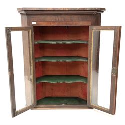 19th century mahogany hanging corner cabinet, projecting cornice, crossband and inlaid detail, two glazed doors enclosing three shaped shelves 