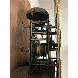 Thomas Hutchinson of Leeds - 18th century 8-day oak longcase clock with as broken arched  pediment and moulded cornice, with a conforming hood door flanked by plain turned pilasters with gesso capitals,  long trunk door with a wavy top on a square plinth with a raised panel, brass dial with cast spandrels,  engraved silvered dial centre and chapter ring with Roman numerals, five minute Arabic's and minute track, with pierced steel hands, seconds pointer,  arched calendar aperture and silvered boss engraved with the makers name to the break arch, dial pinned to a rack striking two train movement with a recoil anchor escapement. With weights and pendulum. Thomas Hutchinson is recorded as working in Leeds from 1760-90.