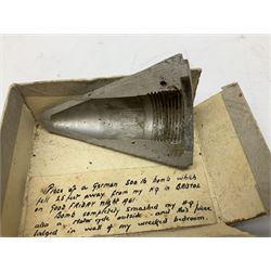 Small collection of WW2 shrapnel and German and British shell parts, most with manuscript details of where and when found including London, Leeds, Bristol, Linton-on-Ouse etc