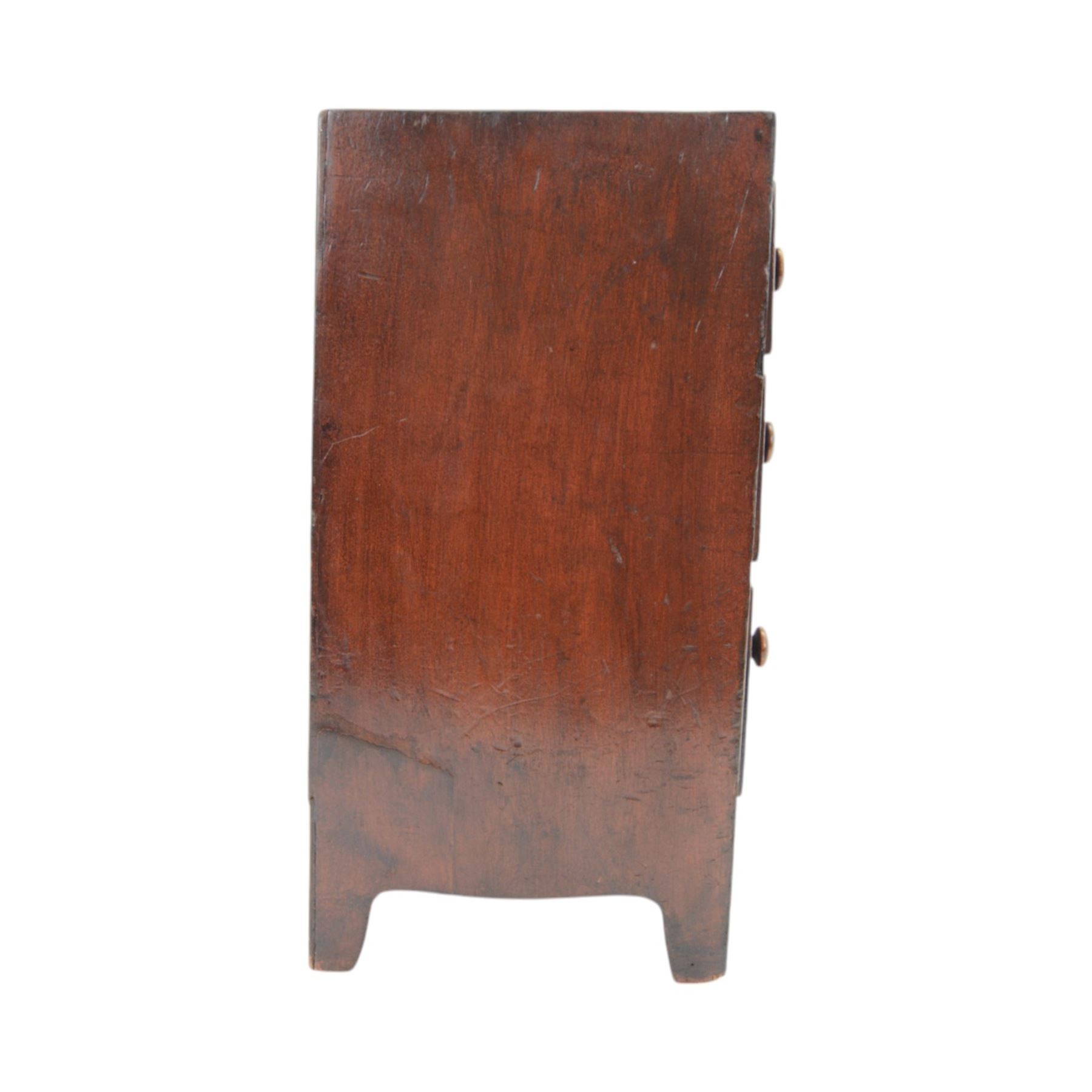 Victorian mahogany 'apprentice piece' miniature chest, rectangular top over two short and two long cock-beaded drawers with turned handles, shaped apron and bracket feet 