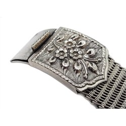  Heavy silver woven bracelet, with embossed flower design buckle, stamped 925  