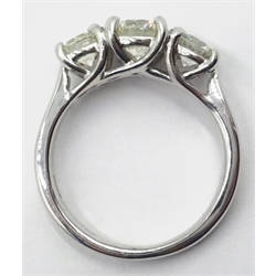 Three stone round brilliant cut diamond, white gold ring hallmarked 18ct, with WGI certificate diamonds 1.5 carat  