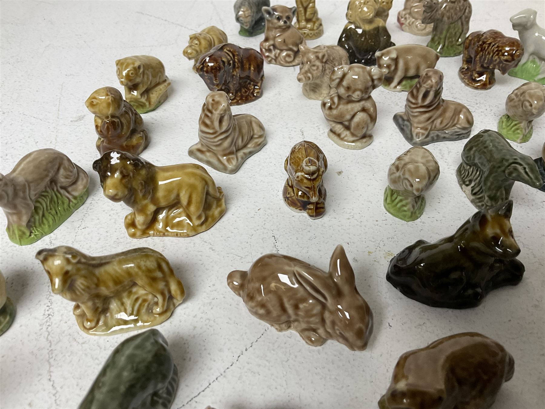 Collection of Wade Whimsies, including lions, birds, rabbits etc 