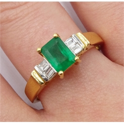 18ct gold emerald ring, with four baguette diamonds either side, hallmarked, emerald approx 0.80 carat