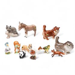 Various Beswick items including two Persian cats 1898, grey and ginger, Raccoon 2194, donk...