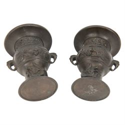 Pair of Japanese bronzed vases, decorated in relief with with birds and dragons, with dragon head handles, H13cm
