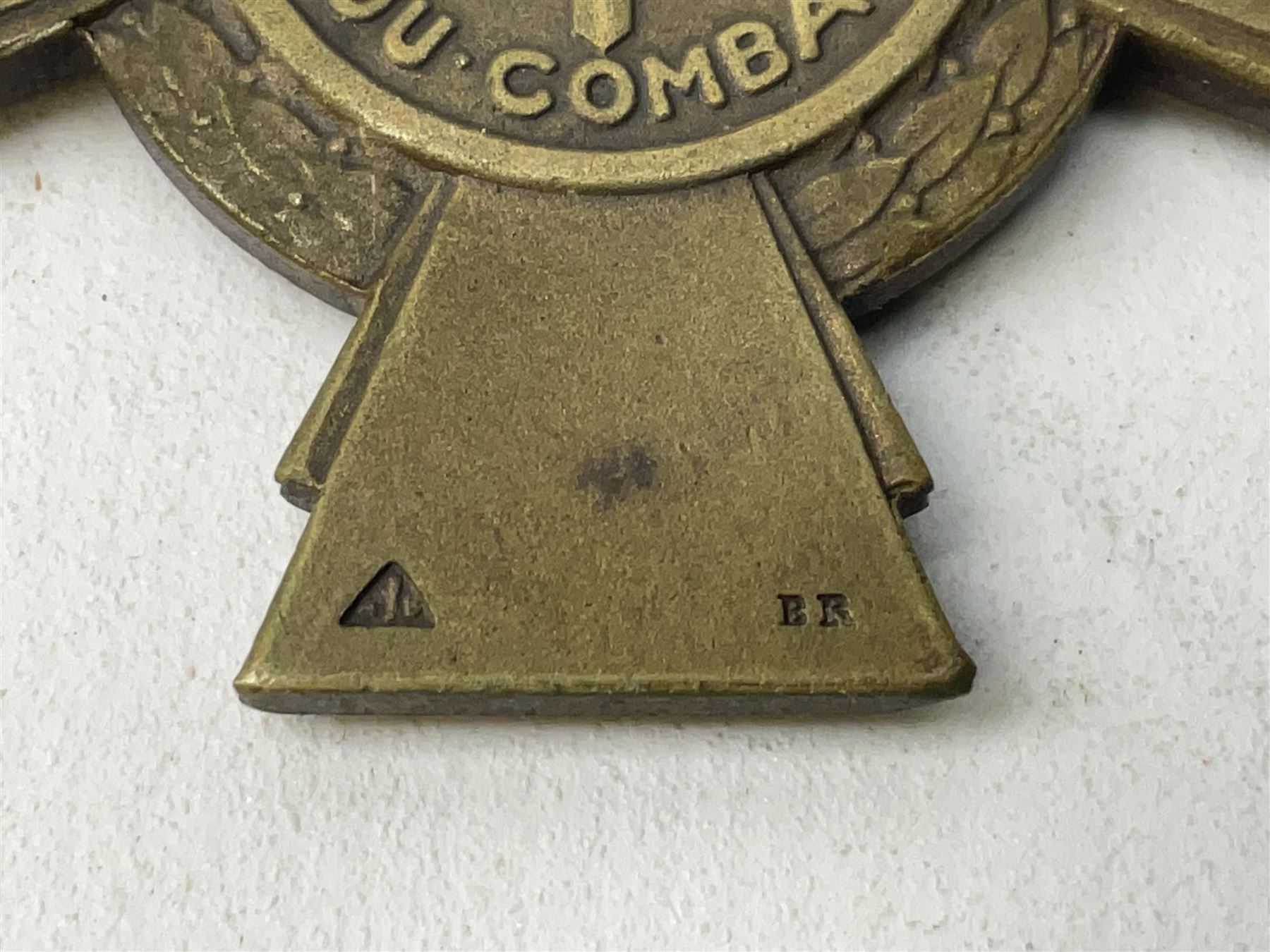 Five continental medals - WW1 Belgian Cross of Fire; WW1 French Croix De Guerre; French Croix De Combattant; French Republic Workers silver merit awarded to L. Mounet 1950; and boxed French Palmes Universitaires Officier d'Academie silver and enamel wreath (5)