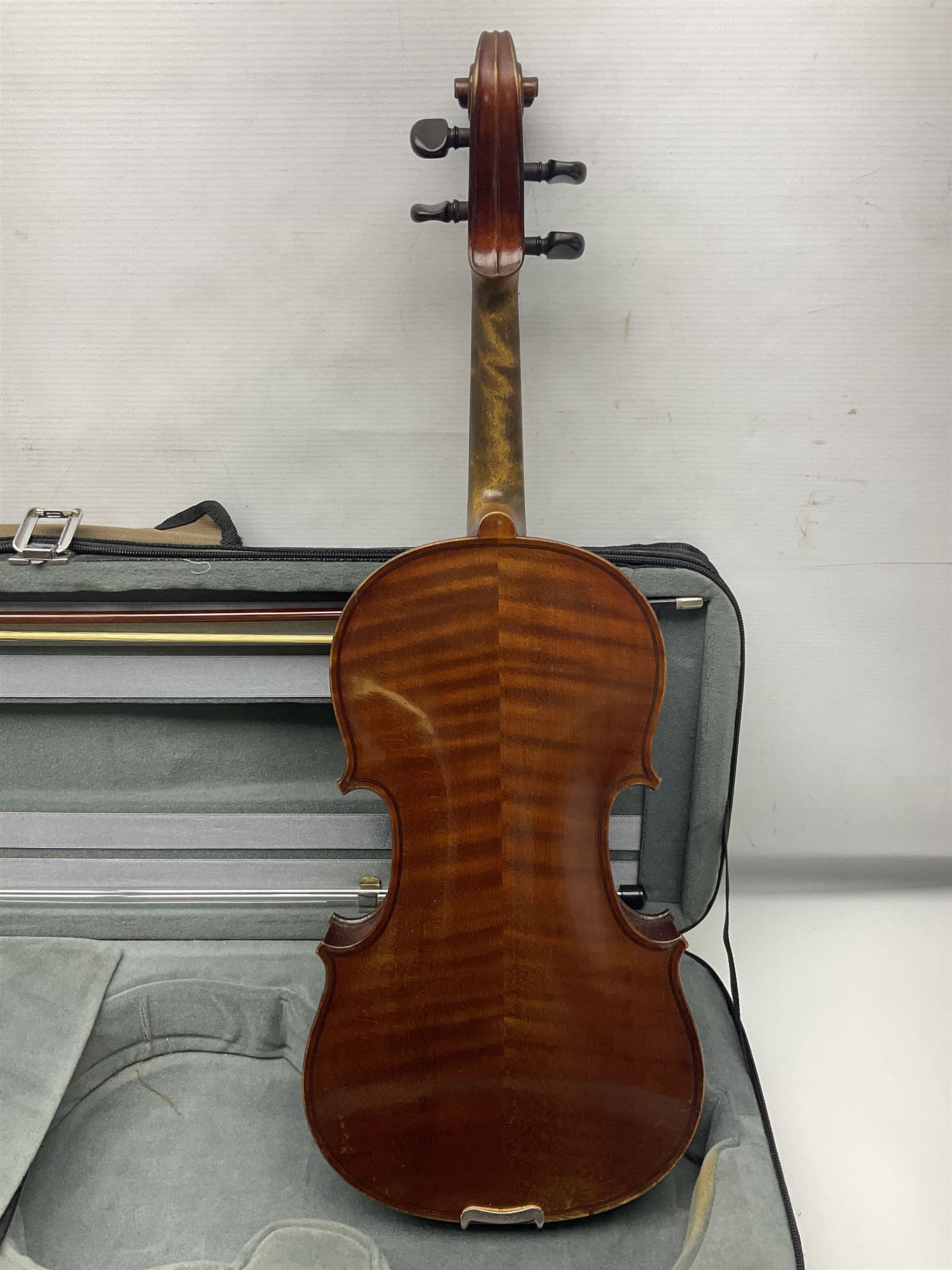 Early 20th century French Mirecourt violin with 35.5cm two-piece maple back and ribs and spruce top; bears label 'The Garrodus Violin H & Co No.1587 Anno 1912' L59cm overall; in modern fitted case with bow