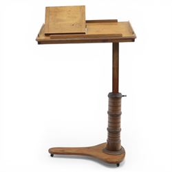 Late Victorian mahogany adjustable reading stand, the rectangular top with moulded and rounded edge and gallery upon a adjustable turned column support, and shaped base