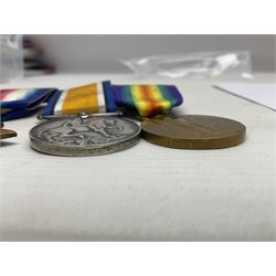 Made-up group of three WWI medals comprising 1914 Star awarded to 23598 Gnr. F. Jefferson R.G.A., British War Medal and Victory Medal with names removed; with ribbons on wearing bar; 1942 Motorist's Medal and small quantity of cap badges, Royalty badges etc