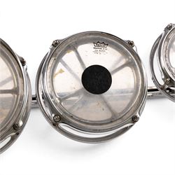 Set of four Remo Roto Toms, with Weather King CS batter heads and chrome tension frames, contained within a fitted carrying case