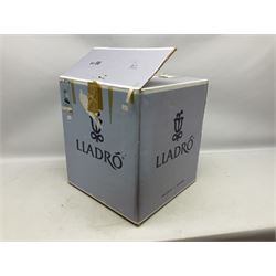 Lladro figure, Jester Serenade, modelled as a ballerina with bouquet of flowers seated before a jester playing the violin, limited edition 2541/3000, sculpted by Antonio Ramos, no 5932, with original box, year issued 1993, year retired 1994, H37cm