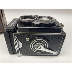 Rollei Rolleiflex 3.5C camera body, serial no 1775847, with 'Planar 1.35 f-75mm' lens serial no 1788432 and 'Heidosmat 1:2.8/75' lens serial no 2440876, complete with a cased set of additional lenses 