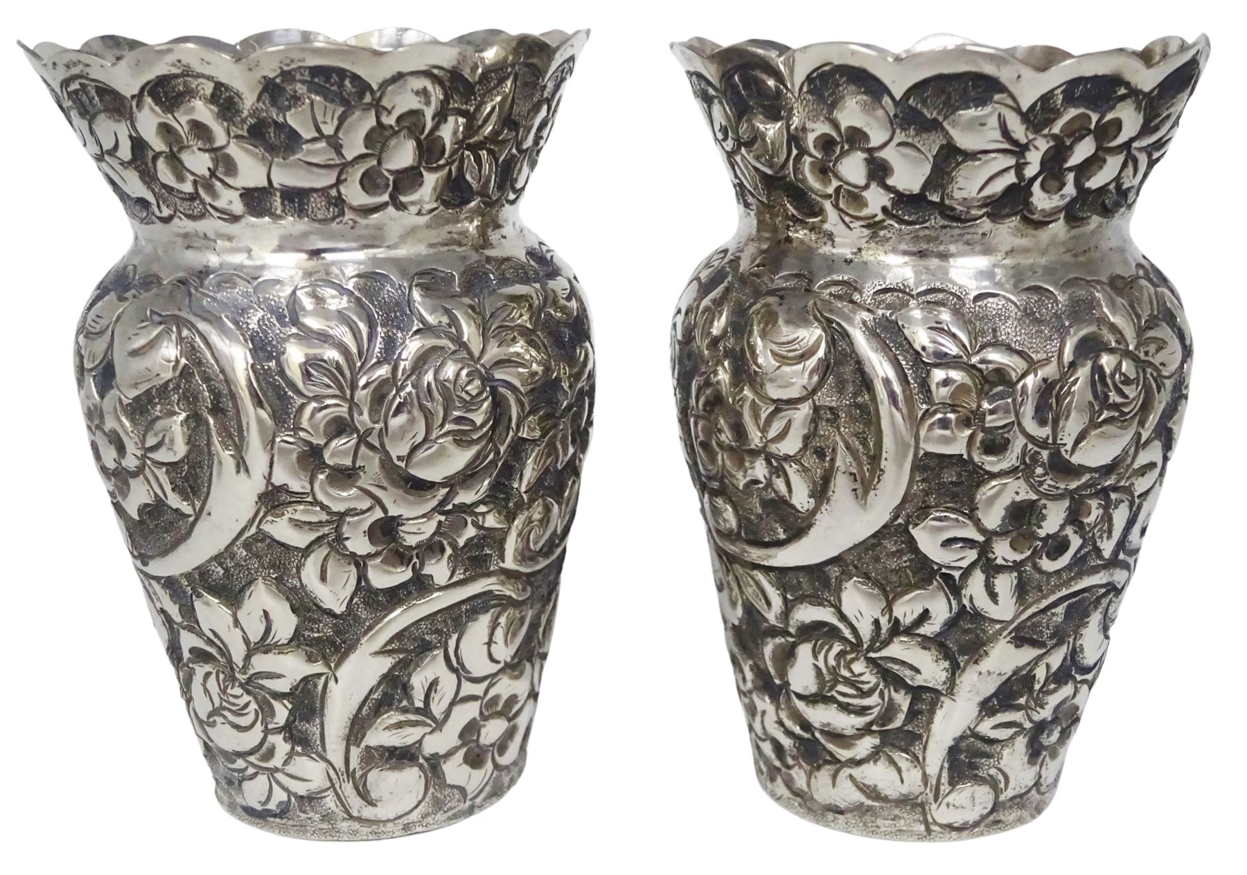 Early 20th century German silver holy water stoop, modelled as Christ upon the cross above a curved cistern with embossed floral decoration, stamped verso 800, also bearing crown and crescent mark and makers mark for Simon Rosenau, H17.5cm, together with a small pair of Continental silver vases, each embossed throughout with flower heads, each stamped beneath 800, and a Dutch box of rectangular form, the underside embossed with hunting scene, the domed cover with two figures, marked with Lion Passant purity mark, Minerva head duty mark, and date letter, probably 1886, approximate total weight (333 grams)