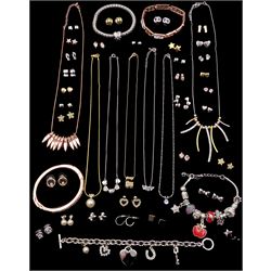 Collection of costume jewellery including two charm bracelets, three other bracelets, seven necklaces and thirty-two pairs of earrings