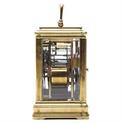 French-19th century 8-day quarter striking carriage clock with strike repeat in a Gorge case, white enamel dial with Roman numerals and steel spade hands, twin barrel movement striking the quarters and hours with two hammers on two coiled gongs to the backplate, silvered platform lever escapement with a jewelled balance and timing screws, with a full, strike, silent, and quarter selection lever to the base. 
Serial number 18874.