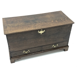  George lll oak mule chest, hinged moulded top above two short and drawers with brass swan-neck handles, on shaped bracket feet, W95cm, D42cm, H54cm  