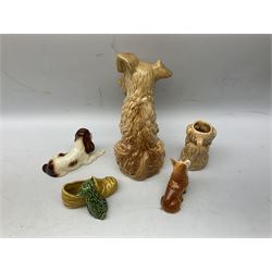 Collection of Sylvac dog figures to include an Art Deco dog jug, Corgi, Spaniel, seated Westie etc (5)