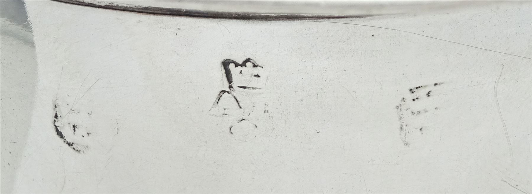 Queen Anne silver tankard, of plain tapering cylindrical form, with stepped and flat-domed cover, twit cast thumbpiece and curved handle, the body engraved with eagle crest, hallmarked Abraham Barachin, Hull, circa 1706, the body and cover stamped once with makers mark and twice with town mark, H18cm, approximate weight 21.46 ozt (667.7 grams)
