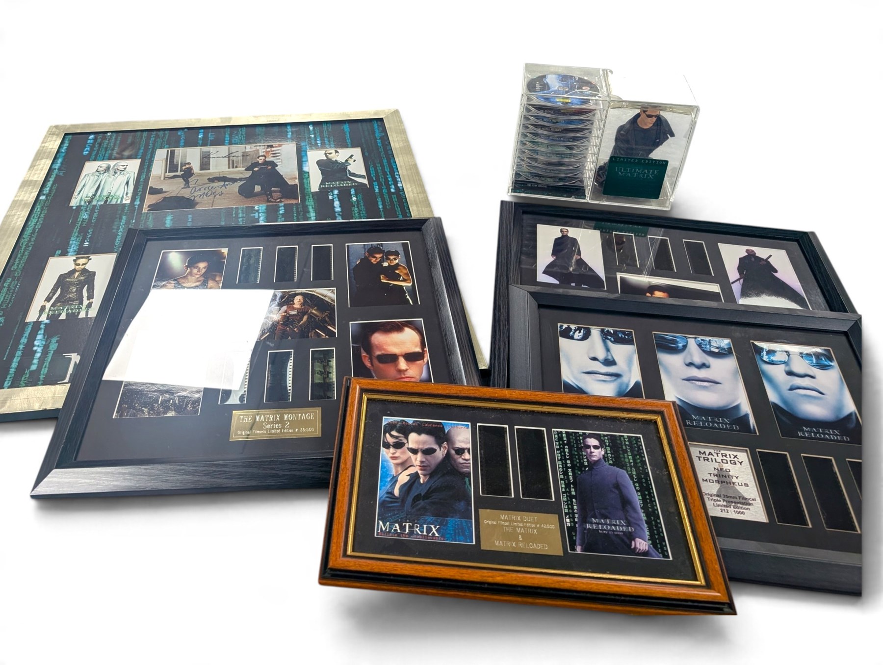Signed The Matrix montage print with spurious signatures, together with framed Matrix prints and film cells and a limited edition ten DVD box set with bust