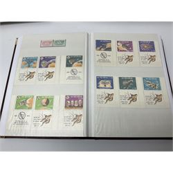 Thematic stamp collection relating to satellites, telecommunications and space from various Countries including Angola, Antigua, Ascension, Australia, Bahamas Barbados, Bhutan, British Virgin Islands, Denmark, Ecuador, Israel etc, a mint and used collection housed in three stockbooks