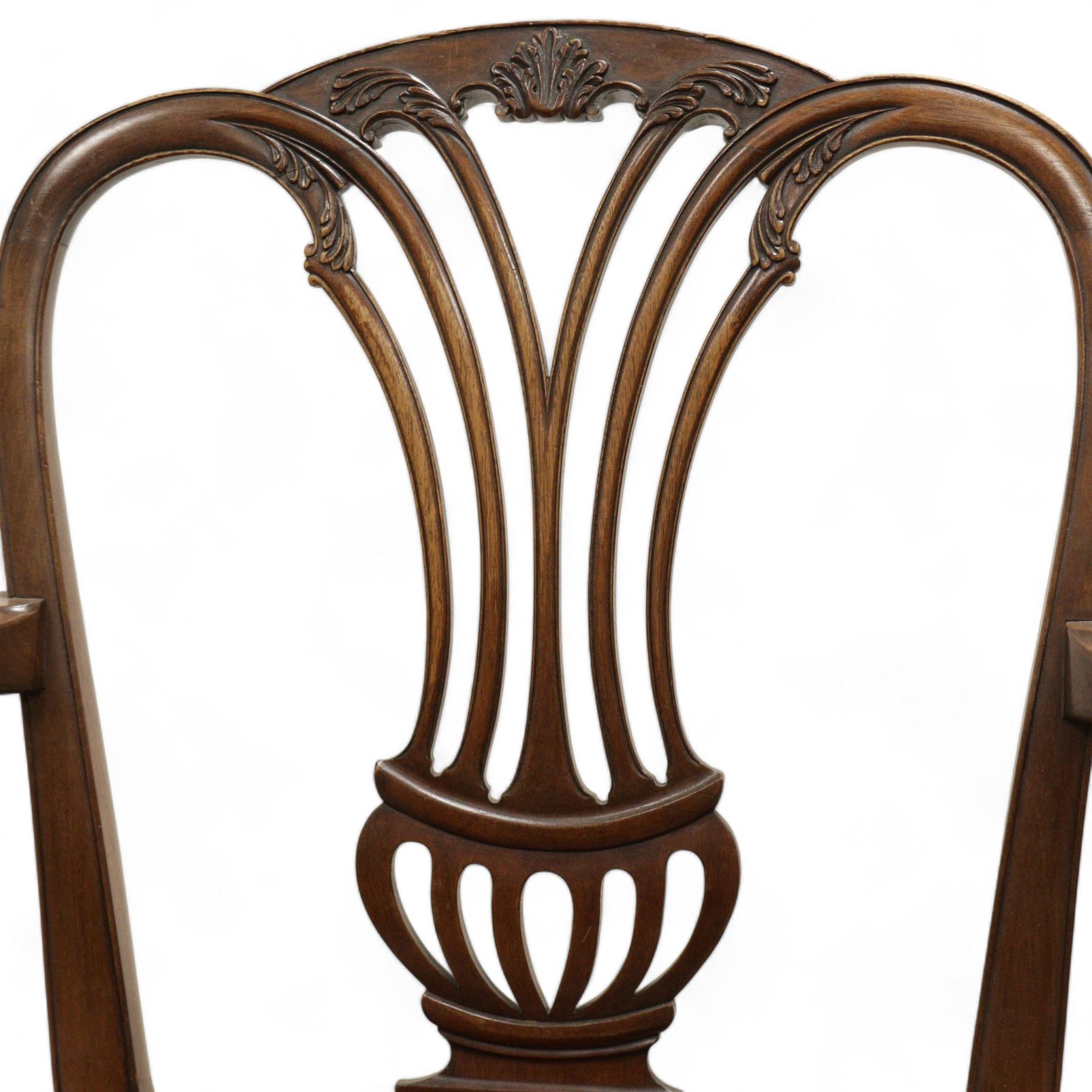 Georgian mahogany open armchair,pierced vase shaped splat carved curled leafage, serpentine tan leather studded seat