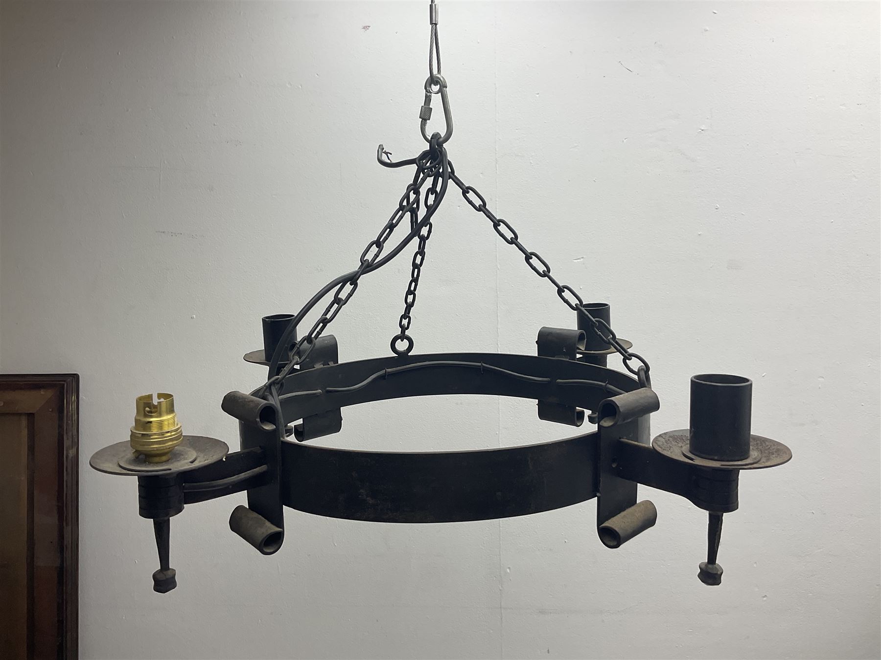 Pair of gothic style wrought iron ceiling lights, each with four branches, D58cm