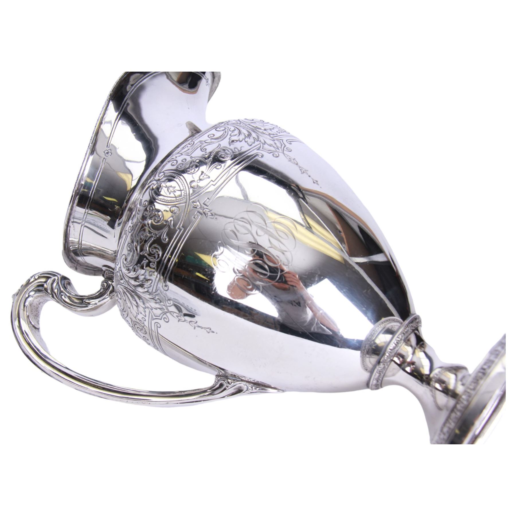 Large late 19th/early 20th century American silver pitcher, the body of ovoid form with embossed and chased foliate band, and acanthus capped scroll handle, upon a spreading circular foot with stiff leaf border, marked for Reed & Barton, Taunton, Massachusetts, and stamped Sterling, H27cm

