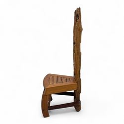 20th century driftwood sculptural hall chair, solid triangular seat over shaped apron, high ladder back formed from weathered and irregular timber, raised on curved legs united by H-stretcher