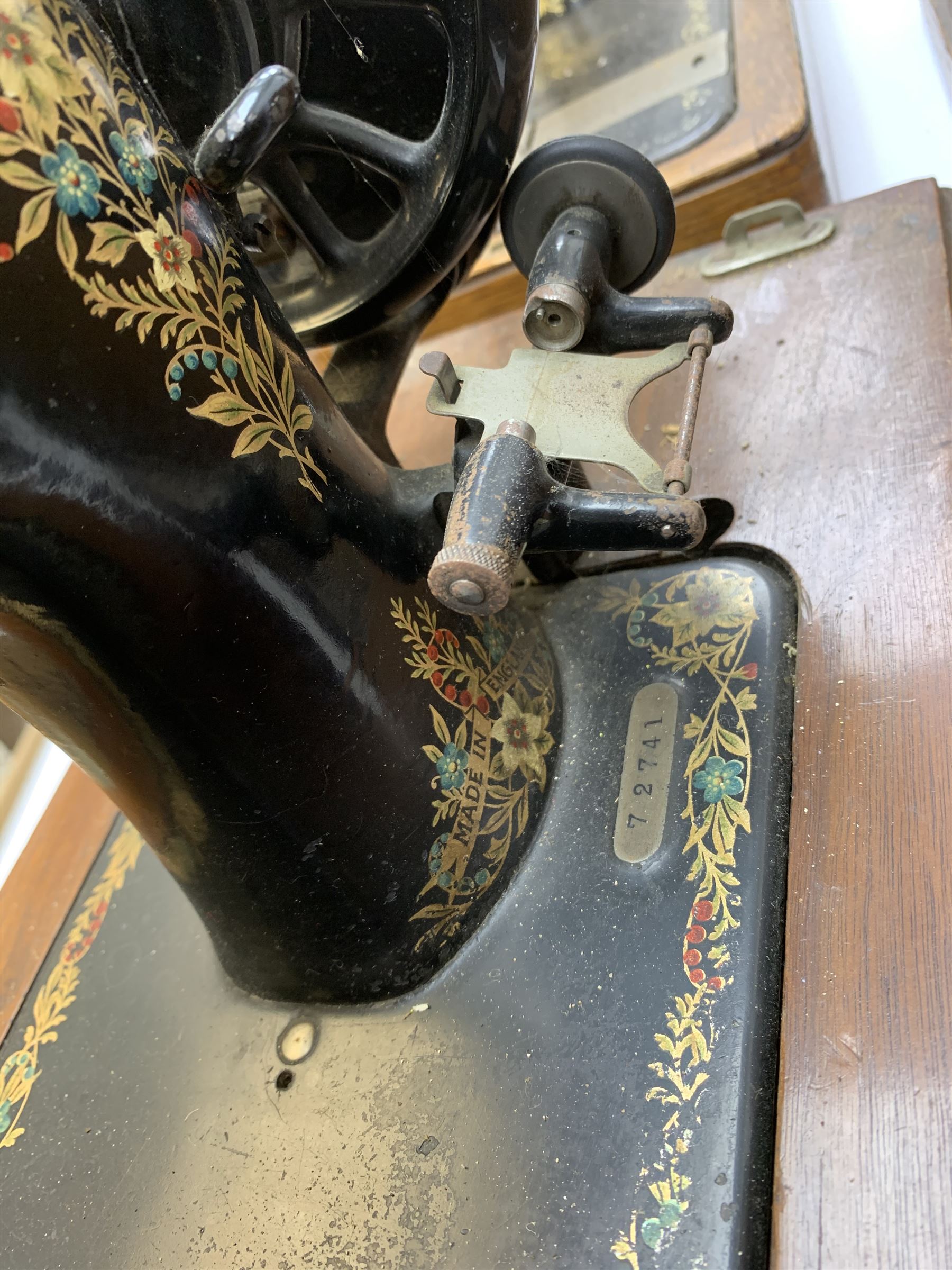Two vintage sewing machines, the first marked Federation, in mahogany case, the second marked Singer, in oak case. 