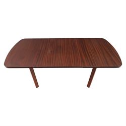 Mid-20th century mahogany extending dining table, with additional leaf, raised on square legs