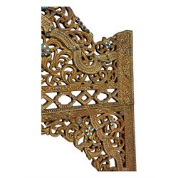 Large North African design carved and painted wall mirror, decorated with floral motifs, pierced foliate scrolls, inset mirrored panels, and colourful painted detailing, enclosing an oval bevelled mirror plate