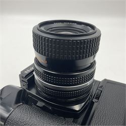 Nikon FM2n camera body, serial no. N8683100, with 'Nikon Zoom-NIKKOR 35-70mm 1:3.3-4.5' len, serial no. 2236565, Nikon MF-16 data back, serial no. 212905 and Nikon MD-12 Motor Drive, serial no 1570382 