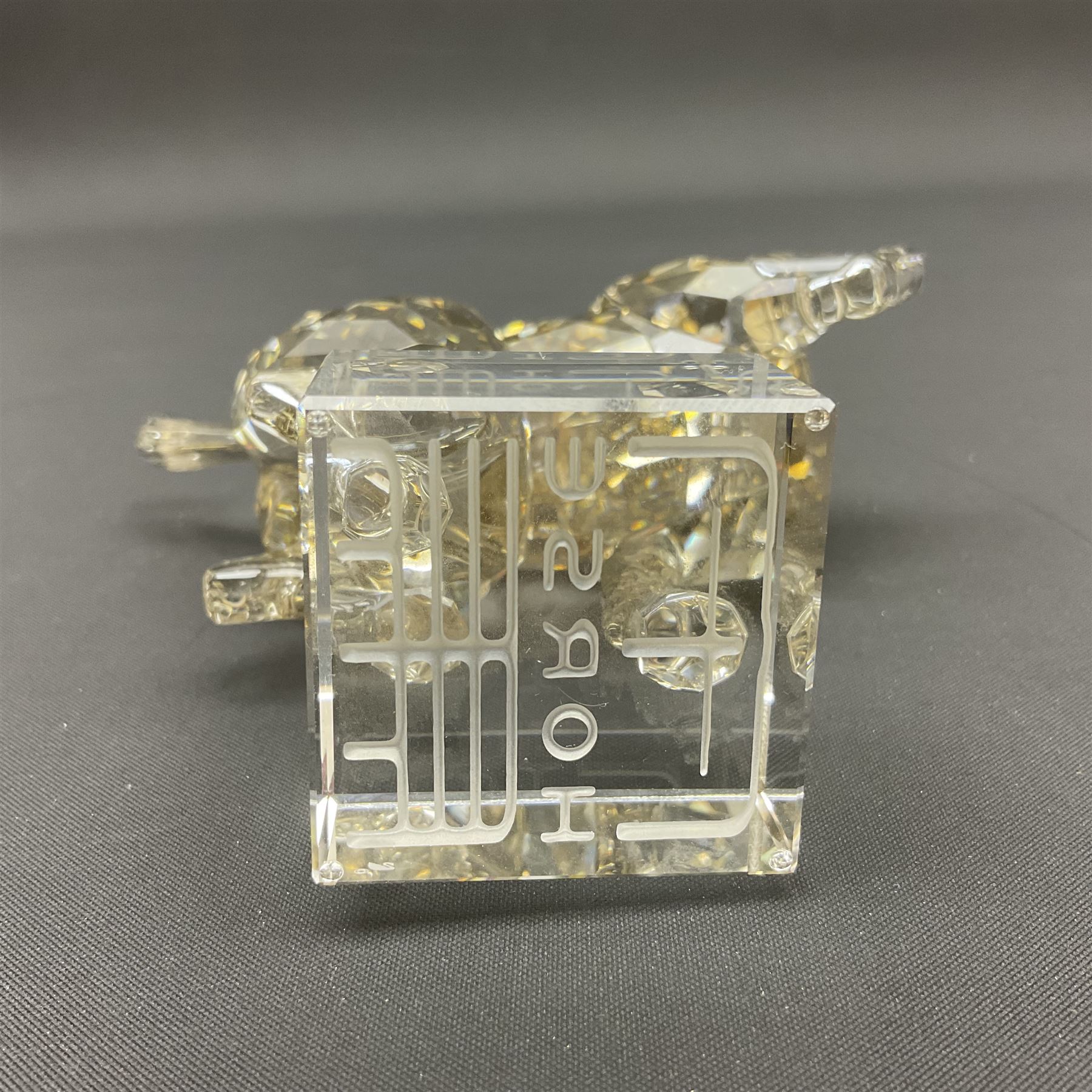 Two Swarovski Crystal Signs of the Zodiac figures, comprising horse and tiger, together with Zodiac dragon holding the flaming pearl, largest H11cm 