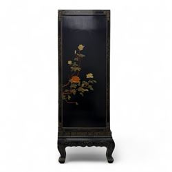 Late 20th century Chinoiserie black lacquer cabinet, the rectangular body decorated with hand-painted floral and foliate motifs in polychrome and gilt, fitted with four panel doors enclosing shelved interior, on shaped apron and stylised cabriole supports with gilt scrollwork